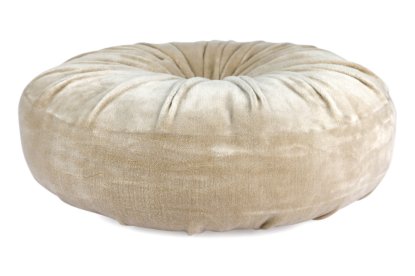 Beige donut pillow bed on a white background