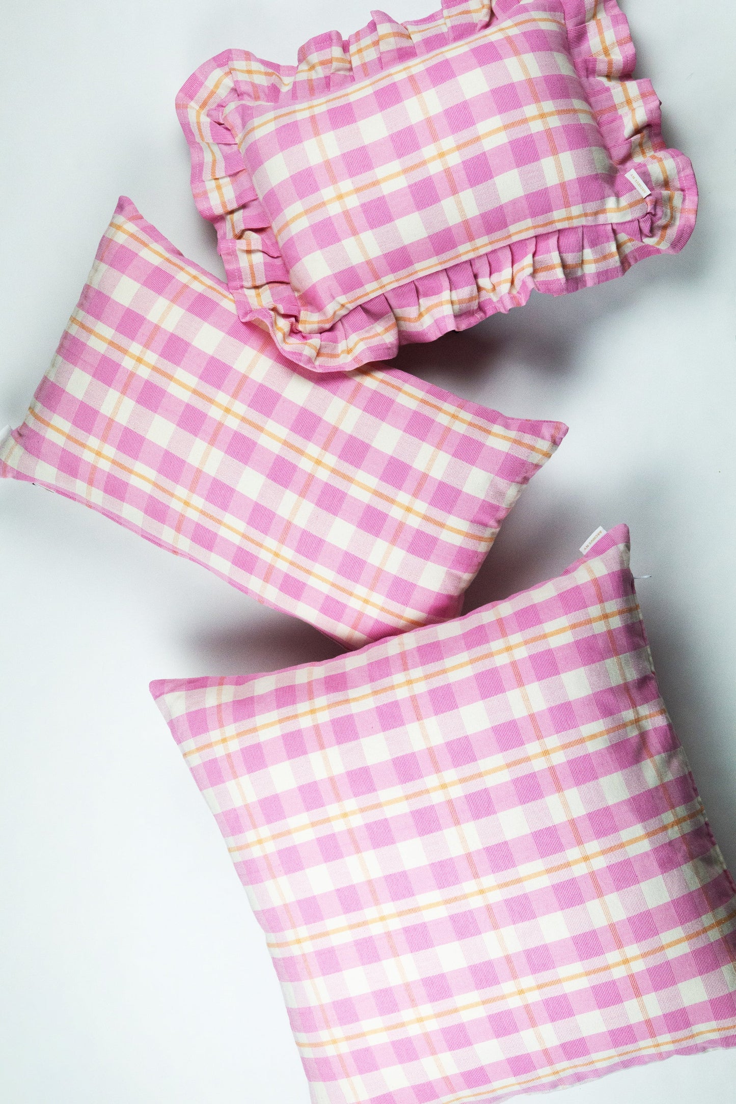Abigail Plaid Rectangle Pillow in Bubblegum and Peach