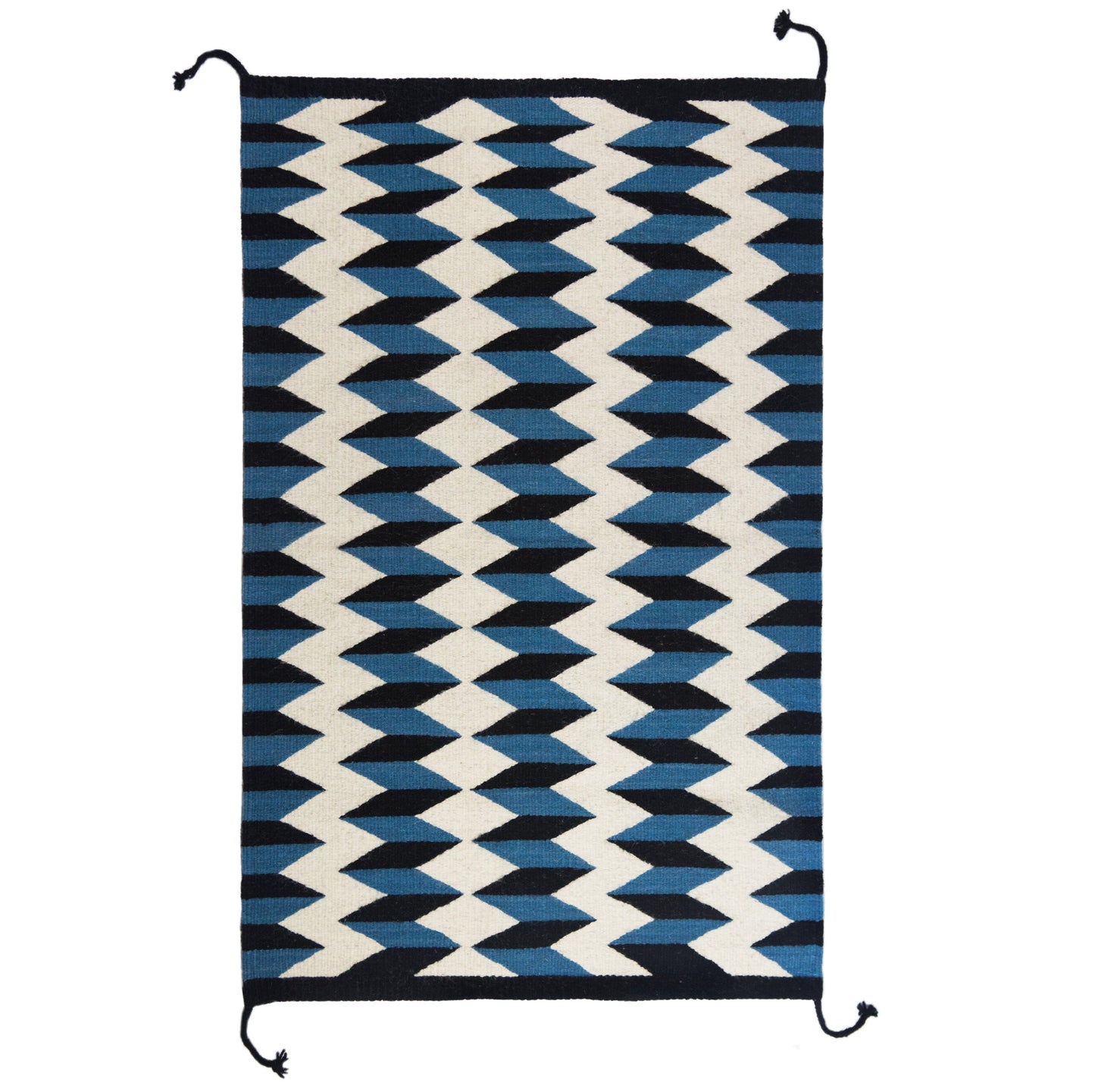 Rug with blue, black, and white zigzag pattern on a white background