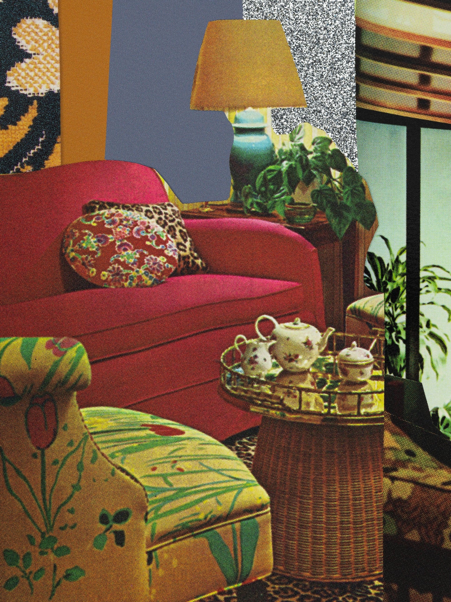 Vintage-style living room with a red sofa, floral armchair, and decorative items.